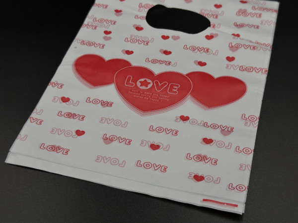 Подарункові поліетиленові пакети 15х20см "Love". Колір біло-червоний.