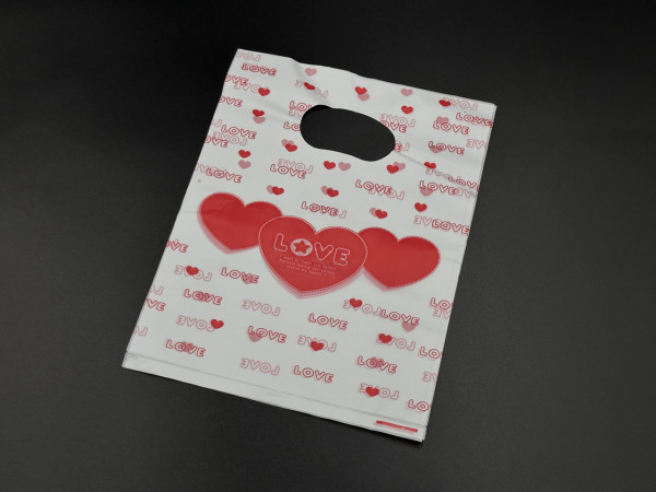 Подарункові поліетиленові пакети 15х20см "Love". Колір біло-червоний.