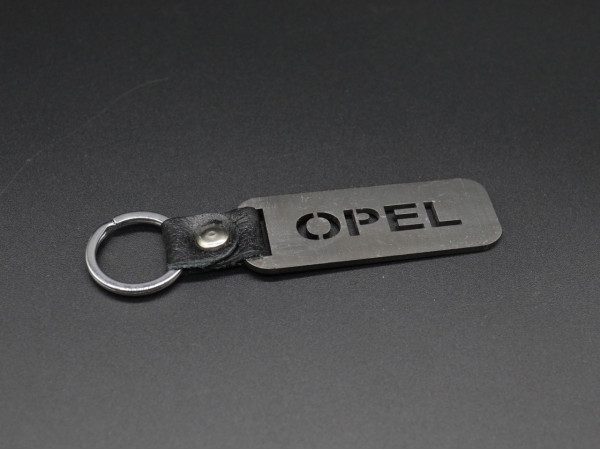 Брелок металевий. Opel. 10х2,5см