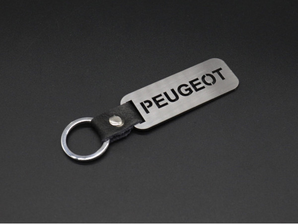 Брелок металевий. Peugeot. 10х2,5см