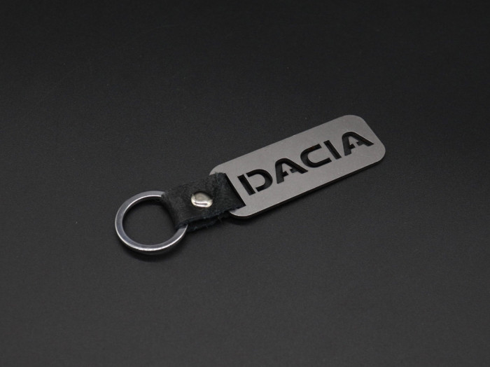 Брелок металевий. Dacia. 10х2,5см